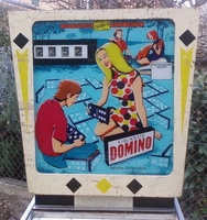 Image # 38030: Grande Domino Backglass with Modified Score Reels 
(Comparing this backglass to the flyer, the placement of the 4 score reels against a larger black background suggest that this game had been previously modified to 5-digit scoring, as was common in Italy, and then was changed back to 4-digit scoring, minus the comma.)