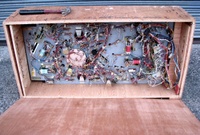 Image # 45316: Grand Lizard Under Playfield 
(This is a New Old Stock playfield in its crate from the manufacturer.)