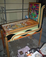 Image # 48674: Happy-Go-Lucky Cabinet - Right 
(The white button on the coin door is not original to this game. Serial number 52566HL.)