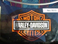 Image # 31823: Harley-Davidson (1st production run) Card Holder - Detail 
(Serial number I656432. The paper sticker with No. 1013 is an Australian serial number.)