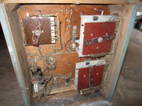 Image # 58210: Hit 'N' Run Inside Backbox 
(Two bells are missing from the center third of this backbox. The coils and their brackets remain.)