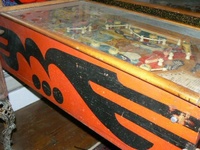 Image # 46876: Baby Face Cabinet - Left 
(The style of flipper shown here is not original to this game.)