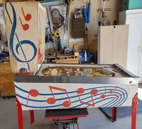 Image # 83732: Hootenanny Cabinet - Left 
(The factory mushroom bumper was replaced on this game with a rollover button. The legs and lockdown bar end caps have been repainted. Serial number H 1759.)
