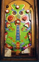 Image # 7337: Horse Shoes Playfield 
(The top three bumpers caps are incorrect for this game. The flippers are missing from this playfield.)