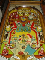 Image # 23898: Kewpie Doll Playfield 
(The two passive bumpers at the top have their rubber rings positioned differently than in the game flyer.)