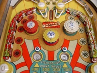 Image # 23900: Kewpie Doll Upper Playfield 
(The two passive bumpers have their rubber rings positioned differently than in the game flyer. )