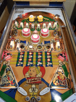 Image # 78164: Kings & Queens Illuminated Playfield 
(The brass liners in the kick-out holes are not original to this game.)