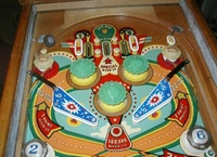 Image # 23815: Lazy-Q Upper Playfield 
(The flyer indicates that the bumpers caps and flippers are gold. The only gold parts evident on the game pictured here are two bumper caps.)