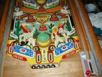 Image # 23817: Lazy-Q Lower Playfield 
(The flyer indicates that the bumpers caps and flippers are gold. The only gold parts evident on the game pictured here are two bumper caps.)