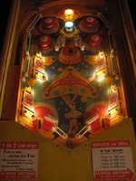 Image # 29184: Balls-A-Poppin Slingshot Kickers Lit 
(Hitting the blue bumper lites the slingshot kickers for increased value and turns off the pop bumper lights and the lights under the apron. Serial number B1710.)