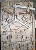Image # 69460: Lightning Ball Under Lower Playfield 
(The ends of the gobble hole troughs have been encased by the owner to prevent viewing inside the machine during play. Serial number M18463.)