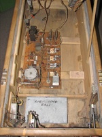 Image # 69462: Lightning Ball Inside Cabinet 
(The 'extra chute' relay was not installed by the factory. The unterminated wires for it are covered by a piece of dark paper stapled to the motor board. Serial number M18463.)