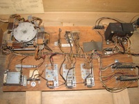 Image # 69464: Lightning Ball Inside Cabinet - Middle 
(The 'extra chute' relay was not installed by the factory. The unterminated wires for it are covered by a piece of dark paper stapled to the motor board. Serial number M18463.)
