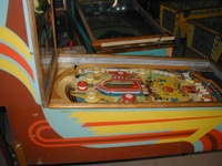 Image # 44170: Lulu Cabinet - Left 
(The '1' insert above the left flipper is not original to this game. The paper apron at playfield bottom is a reproduction.)