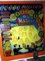 Image # 6179: Madison Square Gardens Backglass Showing Animation Images 
(The wedgehead cabinet in this image is not original to this game.)