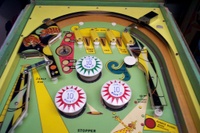 Image # 18032: Bally Hoo Upper German Playfield 
(The bumper caps on this game are incorrect. The original caps had no printing on them.)