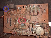 Image # 67435: Majorettes Sample Game - Motor Board - Annotated 
(Two relays on this board do not appear on the sample schematic. The relay circled in orange is labeled '1st coin relay'. The relay circled in blue is the 'Y' Relay (2nd coin relay). Serial number 01006 S.)