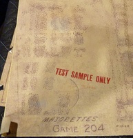 Image # 67448: Majorettes Sample Game - Schematic Date 
(The schematic information has been obscured. The date stamped in red is 'May 14 1964'. From the game with serial number 01006 S.)