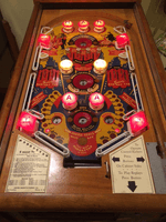 Image # 79320: Manhattan Illuminated Playfield (with retrofit flippers) 
(Serial number 4074.)