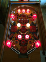 Image # 79321: Manhattan Illuminated Playfield (with retrofit flippers) 
(Serial number 4074.)