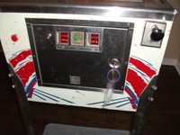 Image # 45039: Mars Trek Cabinet - Front 
(This image shows the serial number stamped in the wood below the coin door.)