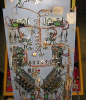 Image # 27823: Mata Hari Under Playfield 
(This game has several serial numbers:1110 is stamped externally on both the cabinet side and head.1112 is tagged on the inside cabinet motor board.1113 is tagged inside the backbox.1116 is tagged under the playfield.)
