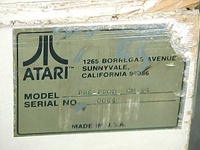Image # 15069: Middle Earth Pre-Production Model Number 
(This game has a white cabinet and has this aluminum plate affixed to the back.)