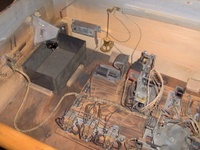 Image # 45792: Minstrel Man Inside Cabinet 
(The brass plumb-bob tilt mechanism is original to this game.)