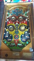 Image # 61251: Band Leader Playfield 
(The five posts below the pop bumpers incorrectly share a single rubber ring. Two of the white posts have been moved from their original factory positions. The six metal post spacers are missing from this playfield.)