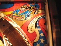Image # 37010: Nitro Ground Shaker Plastic Playfield - Detail 
(This game has a plastic composite playfield.)