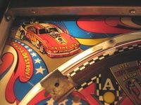 Image # 37009: Nitro Ground Shaker Plastic Playfield - Detail 
(This game has a plastic composite playfield.)