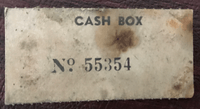 Image # 76014: Olympics Cash Box - Serial Number 
(This tag was found laying unattached inside the cash box.)