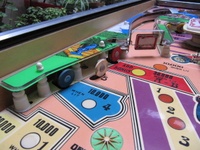Image # 59473: Party Playfield - Detail 
(The white target is a drop target.)