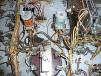 Image # 42743: Planets After-Factory Pop Bumpers 
(This view shows the two pop bumpers and wiring that were added after the game left the factory. From the game with numbers 99609 and 99611.)