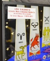 Image # 69186: Planets Backglass - Detail 
(Lou Valenti was a long-time operator on Staten Island, New York. From the game with cabinet serial number 99612.)