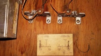 Image # 69242: Rancho Tilt and Knocker Adjustments 
(On the paper card, the right-side staple covers the number '1'.)