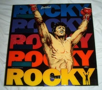 Image # 24852: Rocky Movie Backglass 
(This prop backglass (only three were made) was used on the Rocky pinball machine in the Rocky III movie.)