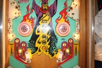 Image # 39375: Abra Ca Dabra Sample Game - Lower Middle Playfield - Light Shields Removed 
(The small white lights shields nearest the flippers may not be original to sample games. They do not appear on the flyer. Serial number 01015 S.)