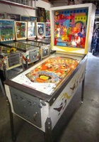 Image # 58012: Bazaar Cabinet - Full View 
(Bally manufactured this game using white flippers with white rubbers on them.)