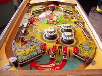 Image # 69106: Safari Playfield - Downfield View 
(The factory passive bumper between the flippers has been replaced by a pop bumper. Serial number 1354.)