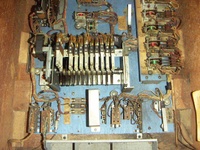 Image # 69134: Safari Inside Cabinet - Front 
(The 'Total Play' meter has been removed from the front left corner of the motor board. One of its two mounting holes is partially obscured by the wiring going to the three fuses. What was mounted in the two screw holes visible here forward of the fuses is unknown. Serial number 1354.)