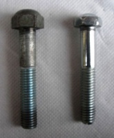 Image # 48756: Sapporo Bolt Comparison 
(The left bolt is from the Sapporo game and is threaded Metric,10 millimeter. For comparison, the bolt on the right is threaded US Standard 3/8 UNC.)