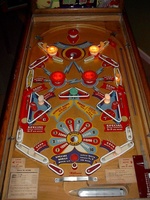 Image # 32742: Saratoga Illuminated Playfield 
(The upper playfield has stationary bumpers that look like flippers.)