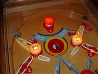 Image # 32743: Saratoga Illuminated Upper Playfield 
(The upper playfield has stationary bumpers that look like flippers.)
