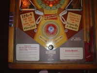 Image # 57757: Score-Board Illuminated Lower Playfield 
(The paper apron is reproduction, but the instruction and score cards are original. Serial number 105019 SB.)
