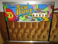Image # 42676: Sea Hunt Backglass 
(This game was obtained New In Box in 2004, five years before this photograph was made. Serial number 8943.)
