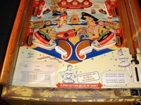 Image # 66234: Serenade Lower Playfield 
(The owner states the pop bumpers caps, standup targets, and flippers are replacement parts.)