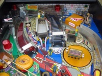 Image # 10161: The Addams Family Special Collectors Edition Upper Playfield 
(Note that this machine includes a custom thing hand decal on thing's box as well as a custom backdrop.)