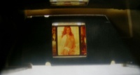 Image # 56119: Sexy Girl Film Strip - Detail 
(The film image is seen reflected in a mirror.)