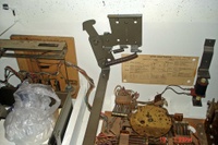 Image # 39891: Sing Along Inside Cabinet 
(This view shows the cashbox, both tilt mechanisms, playfield clamp, score motor, and knocker.)
